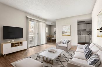 a living room with a couch and a coffee table at South Lamar Village, Austin, 78704